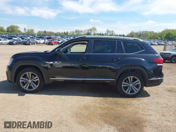 2019 Volkswagen Atlas SEL R-Line z VIN 1V2RR2CA0KC579035, wystawiony jako IAAI lot #42205407 z przebiegiem 66 188 mil mil oraz . Historia ofert i sprzedaży dostępna na DreamBid. Obrazek 14.