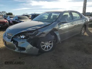 2002 Lexus ES 300 with VIN JTHBF30G720009382, listed as a Copart auction lot 87800365 with 205,349 mi miles and Salvage title. Bid and sale history available at DreamBid. Image 1.