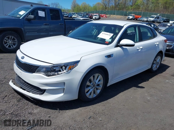 2018 Kia Optima LX with VIN 5XXGT4L31JG261091, listed as a IAAI auction lot 42168652 with 68,070 mi miles. Bid and sale history available at carsss.com. Image 17.