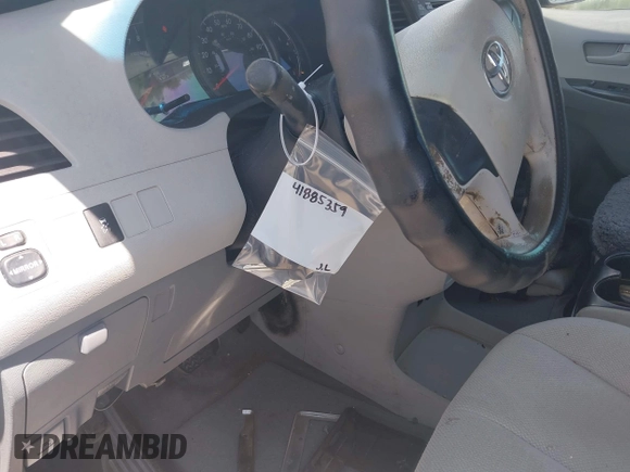 2012 Toyota Sienna with VIN 5TDZK3DC9CS261944, listed as a IAAI auction lot 41885359 with 184,918 mi miles. Bid and sale history available at carsss.com. Image 18.