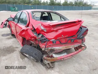 2003 Pontiac Grand Am SE1 with VIN 1G2NF52F73C226451, listed as a IAAI auction lot 41208703 with 112,479 mi miles. Bid and sale history available at carsss.com. Image 3.