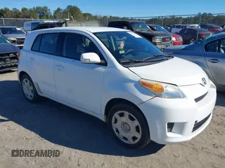 2009 Scion xD with VIN JTKKU10499J033651, listed as a IAAI auction lot 41350000 with 292,848 mi miles. Bid and sale history available at carsss.com. Image 1.