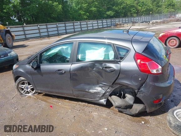 2019 Ford Fiesta SE z VIN 3FADP4EJ9KM125252, wystawiony jako IAAI lot #42221622 z przebiegiem 57 366 mil mil oraz . Historia ofert i sprzedaży dostępna na DreamBid. Obrazek 15.
