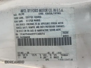 2000 Ford Mustang with VIN 1FAFP404XYF130074, listed as a Copart auction lot 60874945 with 233,035 mi miles and Non repairable. Bid and sale history available at DreamBid. Image 12.