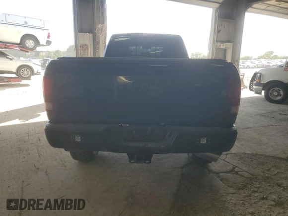 2014 Ram 3500 Laramie with VIN 3C63R3JL9EG258069, listed as a Copart auction lot 71571664 with 104,983 mi miles and Salvage Title. Bid and sale history available at carsss.com. Image 6.