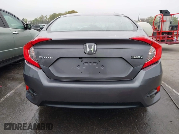 2017 Honda Civic LX z VIN 19XFC2F53HE023730, wystawiony jako IAAI lot #41885003 z przebiegiem 129 595 mil mil oraz . Historia ofert i sprzedaży dostępna na DreamBid. Obrazek 16.