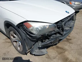 2014 BMW X1 sDrive28i with VIN WBAVM1C5XEVW53725, listed as a IAAI auction lot 41859427 with 181,892 mi miles. Bid and sale history available at carsss.com. Image 6.