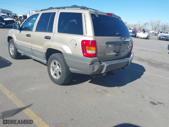 1999 Jeep Grand Cherokee Laredo with VIN 1J4GW58S4XC787702, listed as a IAAI auction lot 41663680 with 177,256 mi miles. Bid and sale history available at carsss.com. Image 3.