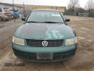 2000 Volkswagen Passat z VIN WVWMA23B5YP299351, wystawiony jako Copart lot #44905385 z przebiegiem 186 402 mil mil oraz Czysty tytuł • Clean title. Historia ofert i sprzedaży dostępna na DreamBid. Obrazek 5.