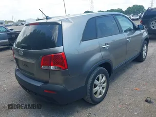 2013 Kia Sorento LX with VIN 5XYKT3A17DG405636, listed as a IAAI auction lot 42595956 with 192,632 mi miles and . Bid and sale history available at DreamBid. Image 4.