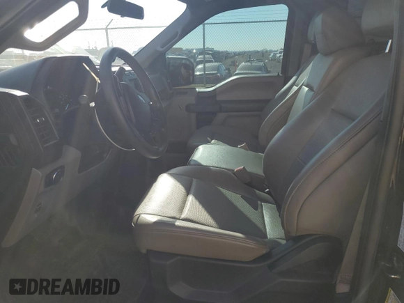 2020 Ford F-150 XL with VIN 1FTMF1C5XLKF15450, listed as a Copart auction lot 79884874 with 32,575 mi miles and Salvage Title. Bid and sale history available at carsss.com. Image 7.
