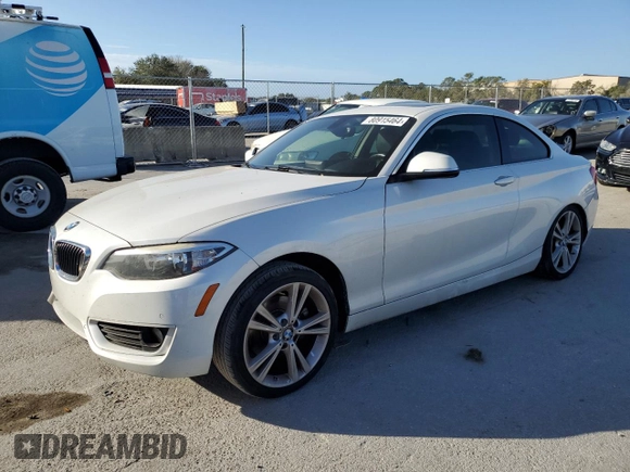 2015 BMW 2 Series 228i with VIN WBA1F5C59FV257321, listed as a Copart auction lot 80915464 with 113,776 mi miles and Salvage title. Bid and sale history available at DreamBid. Image 1.