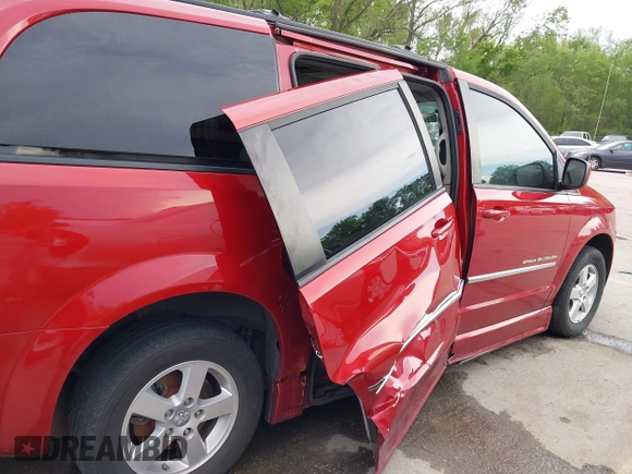 2010 Dodge Grand Caravan SXT z VIN 2D4RN5D19AR258407, wystawiony jako IAAI lot #42072185 z przebiegiem 205 424 mil mil oraz . Historia ofert i sprzedaży dostępna na DreamBid. Obrazek 6.