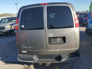 2012 GMC Savana z VIN 1GJZ71FG8C1132413, wystawiony jako Copart lot #74216844 z przebiegiem 145 959 mil mil oraz Szkoda całkowita • Salvage title. Historia ofert i sprzedaży dostępna na DreamBid. Obrazek 6.