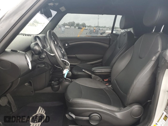 2013 MINI Convertible with VIN WMWZN3C52DT569306, listed as a Copart auction lot 56594535 with 80,247 mi miles and Clean title. Bid and sale history available at DreamBid. Image 7.