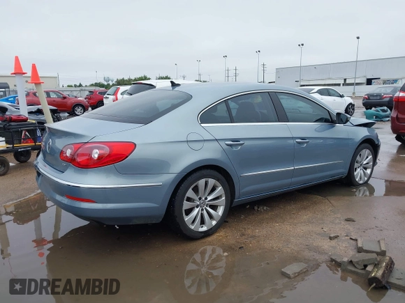2012 Volkswagen CC Sport z VIN WVWMN7AN4CE514222, wystawiony jako IAAI lot #42185202 z przebiegiem 92 656 mil mil oraz . Historia ofert i sprzedaży dostępna na DreamBid. Obrazek 4.