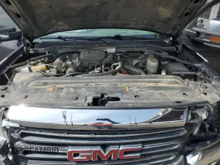 2015 GMC Sierra 2500HD SLT with VIN 1GT12ZE85FF589148, listed as a Copart auction lot 51329515 with 194,378 mi miles and Salvage title. Bid and sale history available at DreamBid. Image 11.