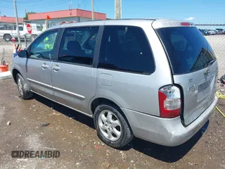 2000 Mazda MPV DX with VIN JM3LW28G8Y0125047, listed as a IAAI auction lot 42305890 with 214,647 mi miles and . Bid and sale history available at DreamBid. Image 3.