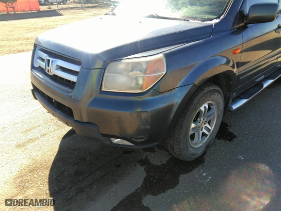 2006 Honda Pilot EX-L with VIN 2HKYF18586H514424, listed as a IAAI auction lot 41663778 with 210,020 mi miles. Bid and sale history available at carsss.com. Image 6.