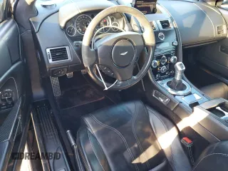 2012 Aston Martin DBS z VIN SCFFBCBD0CGE03238, wystawiony jako Copart lot #87450334 z przebiegiem 89 666 mil mil oraz Tytuł czysty. Historia ofert i sprzedaży dostępna na DreamBid. Obrazek 8.