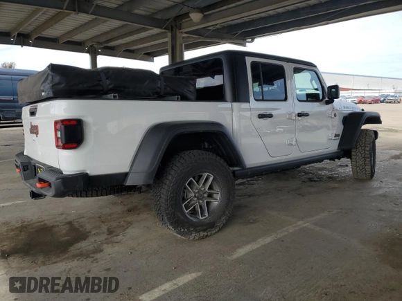 2024 Jeep Gladiator Mojave X с VIN 1C6JJTEGXRL105429, выставлен на аукционе Copart как лот 49850525 с пробегом 4 692 миль миль и Списание • Salvage title. История ставок и продаж доступна на DreamBid. Изображение 3.
