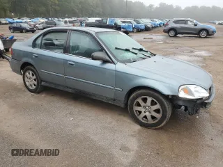 2000 Honda Civic VP with VIN 2HGEJ6612YH566224, listed as a Copart auction lot 74302284 with 197,203 mi miles and Salvage Title. Bid and sale history available at carsss.com. Image 4.