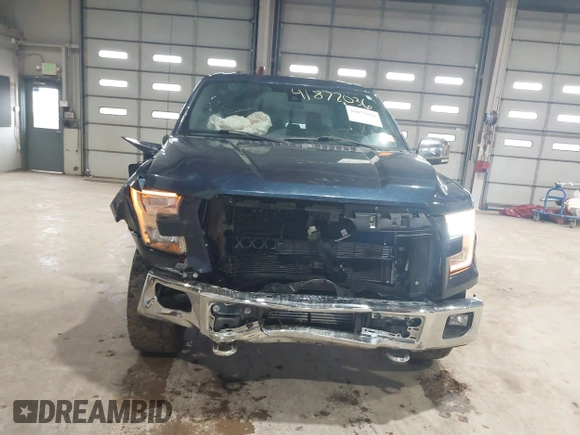 2015 Ford F-150 XLT with VIN 1FTEW1EG4FFB88589, listed as a IAAI auction lot 41877036 with 211,155 mi miles. Bid and sale history available at carsss.com. Image 6.