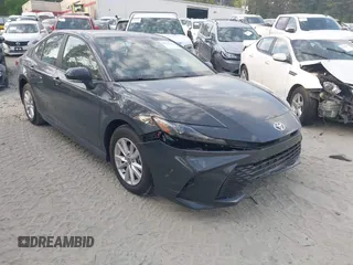 2025 Toyota Camry LE with VIN 4T1DAACKXSU541257, listed as a IAAI auction lot 42052246 with 13,585 mi miles and . Bid and sale history available at DreamBid. Image 1.