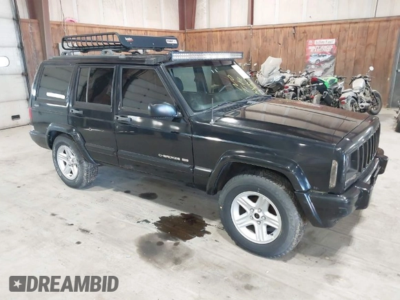 2001 Jeep Cherokee Sport z VIN 1J4FF58S11L562933, wystawiony jako IAAI lot #41944672 z przebiegiem 163 078 mil mil oraz . Historia ofert i sprzedaży dostępna na DreamBid. Obrazek 1.