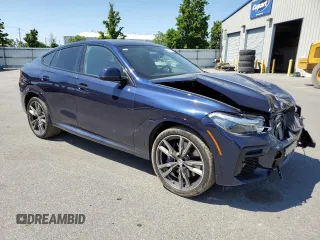 2023 BMW X6 M50i with VIN 5UXCY8C09P9P28422, listed as a Copart auction lot 52818133 with 4,131 mi miles and Salvage Title. Bid and sale history available at carsss.com. Image 4.