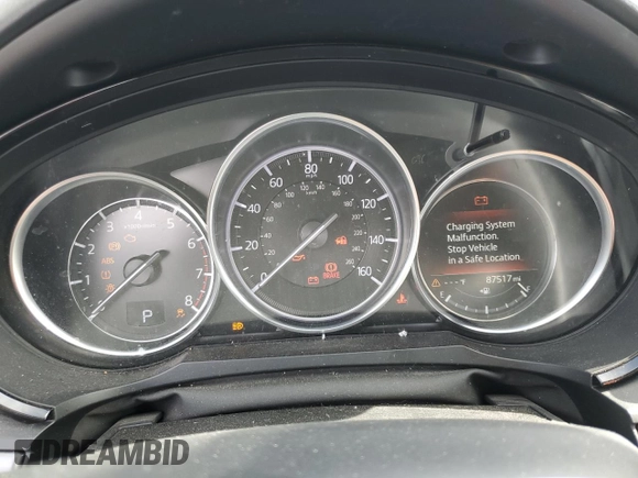 2019 Mazda CX-9 Touring with VIN JM3TCBCY0K0309947, listed as a Copart auction lot 56897815 with 87,517 mi miles and Salvage title. Bid and sale history available at DreamBid. Image 9.