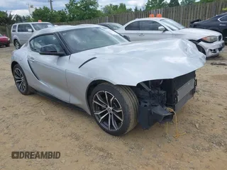 2021 Toyota Supra 2.0 z VIN WZ1DB2C07MW040454, wystawiony jako IAAI lot #42352981 z przebiegiem 30 416 mil mil oraz . Historia ofert i sprzedaży dostępna na DreamBid. Obrazek 1.