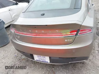 2018 Lincoln MKZ Hybrid Reserve z VIN 3LN6L5MU2JR602228, wystawiony jako IAAI lot #41441004 z przebiegiem 71 047 mil mil oraz . Historia ofert i sprzedaży dostępna na DreamBid. Obrazek 16.