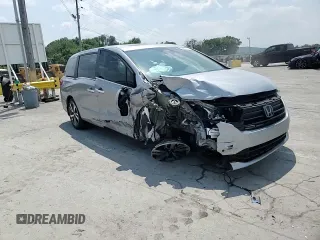 2023 Honda Odyssey Touring z VIN 5FNRL6H8XPB037385, wystawiony jako Copart lot #59461215 z przebiegiem 32 150 mil mil oraz Szkoda całkowita • Salvage title. Historia ofert i sprzedaży dostępna na DreamBid. Obrazek 14.