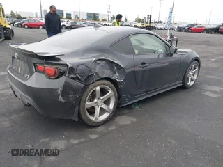 2014 Scion FR-S z VIN JF1ZNAA1XE8707577, wystawiony jako IAAI lot #42054339 z przebiegiem 95 241 mil mil oraz . Historia ofert i sprzedaży dostępna na DreamBid. Obrazek 13.