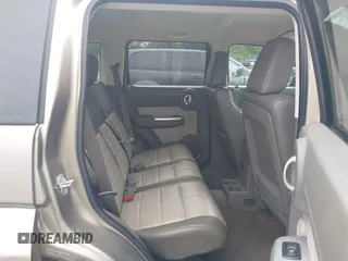 2007 Dodge Nitro SLT z VIN 1D8GT58K07W735904, wystawiony jako IAAI lot #42216665 z przebiegiem 168 000 mil mil oraz . Historia ofert i sprzedaży dostępna na DreamBid. Obrazek 8.