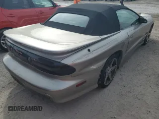 2002 Pontiac Firebird Trans Am z VIN 2G2FV32G022171702, wystawiony jako Copart lot #74819264 z przebiegiem Nie podano mil oraz Nie do naprawy • Non repairable. Historia ofert i sprzedaży dostępna na DreamBid. Obrazek 3.
