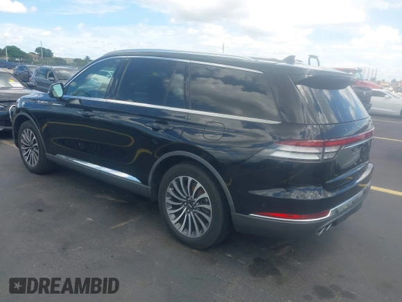 2021 Lincoln Aviator Reserve with VIN 5LM5J7WC0MGL12385, listed as a IAAI auction lot 42472422 with 20,404 mi miles and . Bid and sale history available at DreamBid. Image 3.