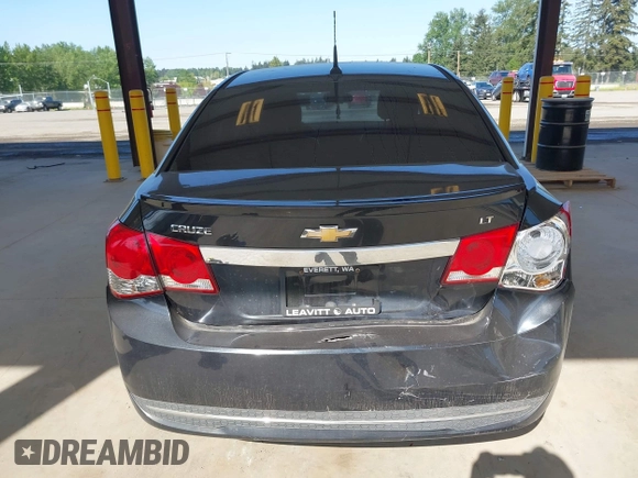 2014 Chevrolet Cruze 2LT z VIN 1G1PE5SB6E7260163, wystawiony jako IAAI lot #42182669 z przebiegiem 154 429 mil mil oraz . Historia ofert i sprzedaży dostępna na DreamBid. Obrazek 16.