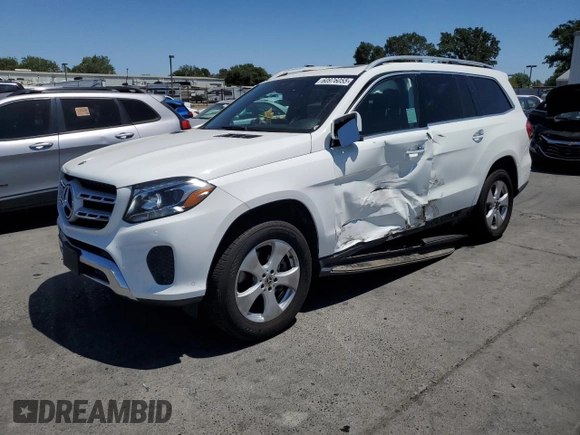 2018 Mercedes-Benz GLS 450 with VIN 4JGDF6EE5JB007020, listed as a Copart auction lot 60976055 with 99,238 mi miles and Salvage title. Bid and sale history available at DreamBid. Image 1.