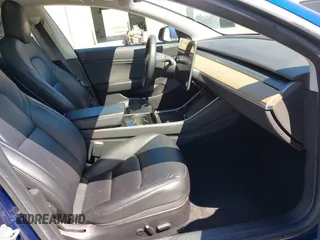2019 Tesla Model 3 Mid Range with VIN 5YJ3E1EA0KF425079, listed as a IAAI auction lot 41871022 with 61,684 mi miles and . Bid and sale history available at DreamBid. Image 5.