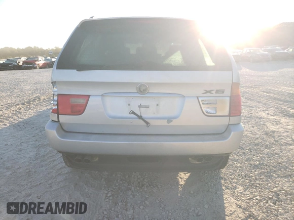 2000 BMW X5 4.4i with VIN WBAFB3355YLH05755, listed as a Copart auction lot 77136744 with 0 mi miles and Salvage Title. Bid and sale history available at carsss.com. Image 6.