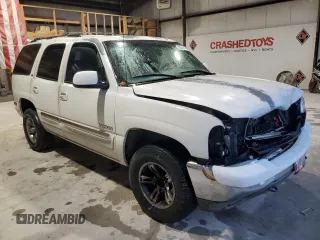 2000 GMC Yukon SLT with VIN 1GKEC13T9YJ159294, listed as a Copart auction lot 82626544 with 0 mi miles and Salvage Title. Bid and sale history available at carsss.com. Image 4.