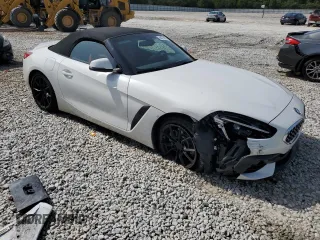 2020 BMW Z4 sDrive30i with VIN WBAHF3C06LWW83982, listed as a Copart auction lot 66076064 with 71,855 mi miles and Salvage Title. Bid and sale history available at carsss.com. Image 4.
