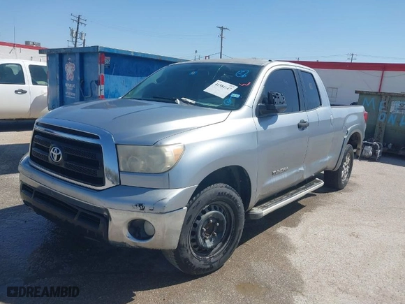2010 Toyota Tundra 2WD Truck with VIN 5TFRM5F11AX019089, listed as a IAAI auction lot 41584147 with 290,360 mi miles. Bid and sale history available at carsss.com. Image 2.