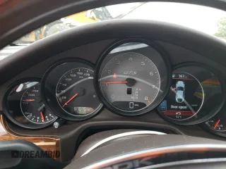 2014 Porsche Panamera GTS z VIN WP0AF2A76EL083319, wystawiony jako Copart lot #55517175 z przebiegiem 87 075 mil mil oraz Szkoda całkowita • Salvage title. Historia ofert i sprzedaży dostępna na DreamBid. Obrazek 9.