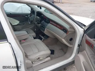 2005 Cadillac DeVille with VIN 1G6KD54Y75U162964, listed as a IAAI auction lot 40794096 with 165,341 mi miles. Bid and sale history available at carsss.com. Image 5.