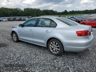 2012 Volkswagen Jetta SE with VIN 3VWDX7AJ1CM389131, listed as a Copart auction lot 64947474 with 140,331 mi miles and Salvage title. Bid and sale history available at DreamBid. Image 2.