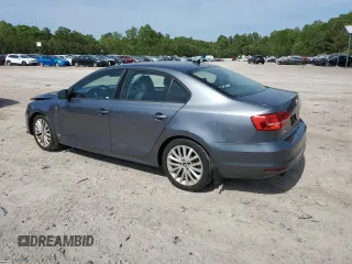 2015 Volkswagen Jetta SE z VIN 3VWD17AJ5FM309965, wystawiony jako Copart lot #54930665 z przebiegiem 141 918 mil mil oraz Szkoda całkowita • Salvage title. Historia ofert i sprzedaży dostępna na DreamBid. Obrazek 2.