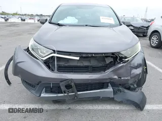 2019 Honda CR-V LX with VIN 2HKRW5H31KH400639, listed as a IAAI auction lot 42159026 with 45,245 mi miles and . Bid and sale history available at carsss.com. Image 6.